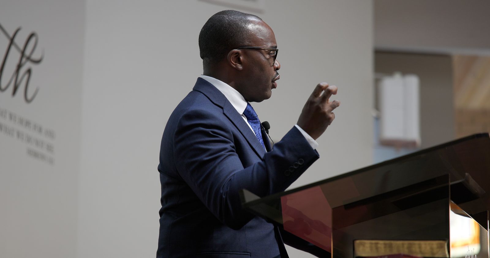 Man preaching at a pulpit